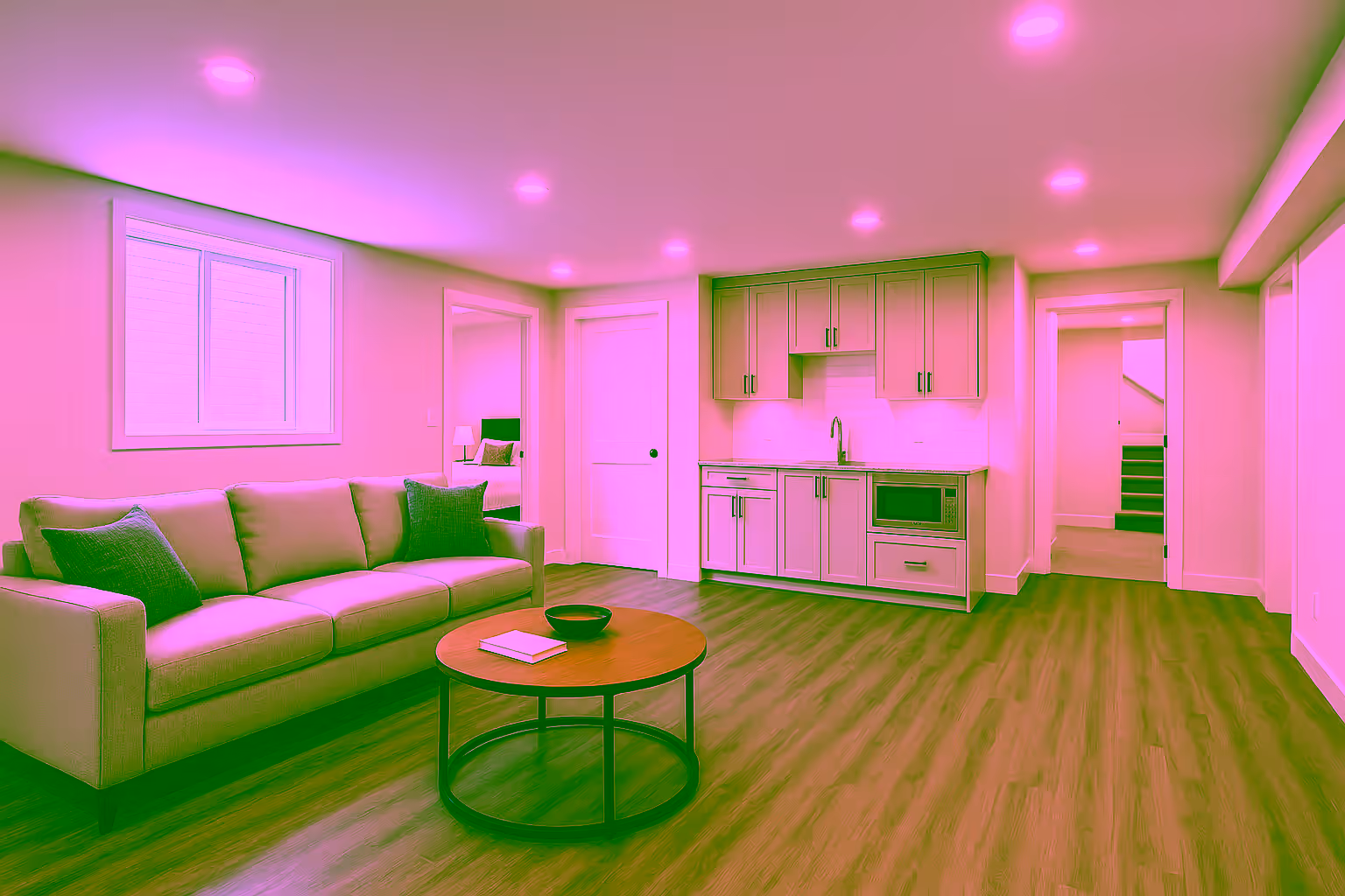 Basement renovations in Kelowna — legal suites, family rooms, gyms Kelowna basement renovation with egress window and warm finishes