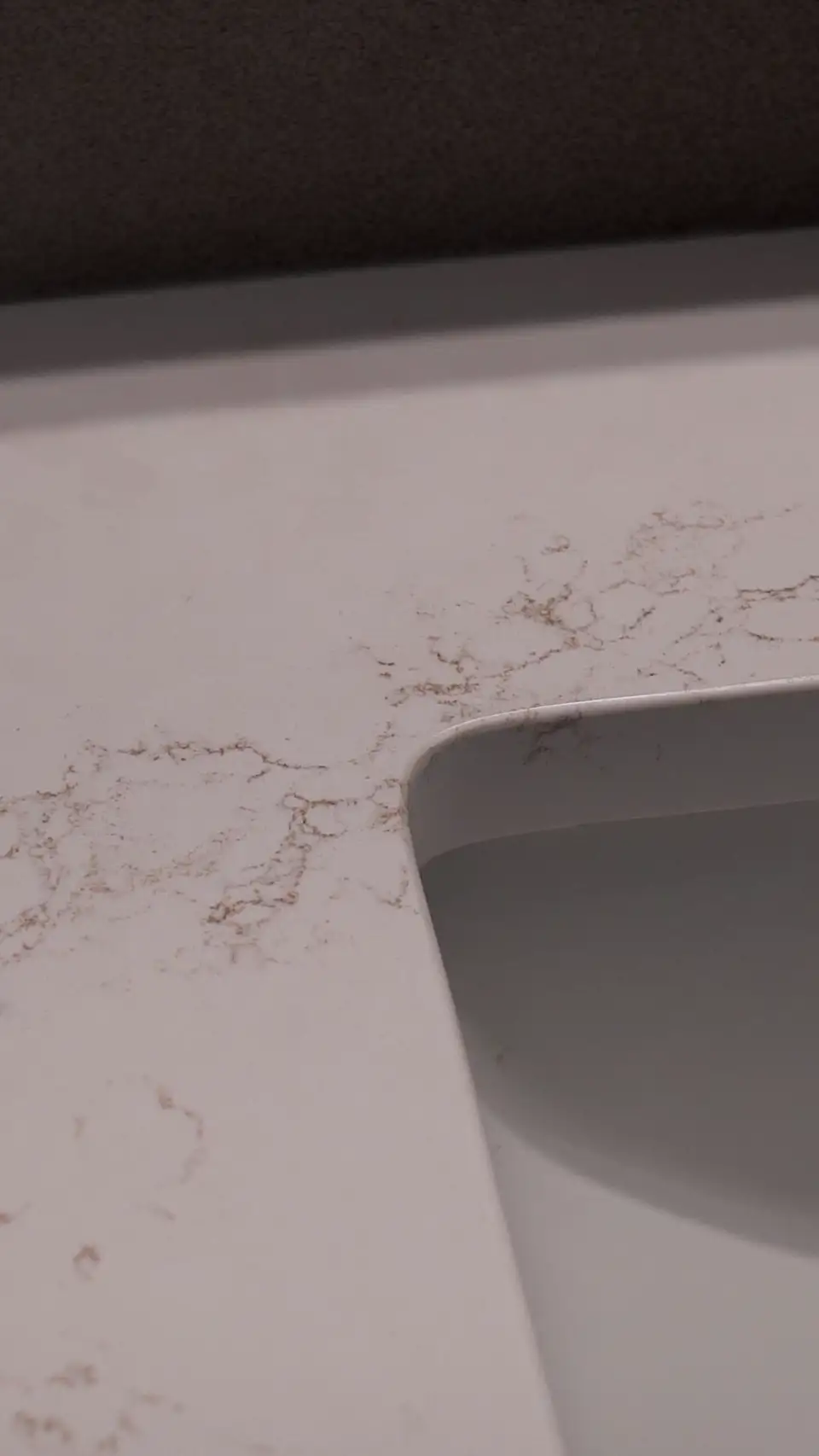 Kelowna bathroom renovation — quartz countertop detail Quartz countertop close‑up in Kelowna bathroom renovation