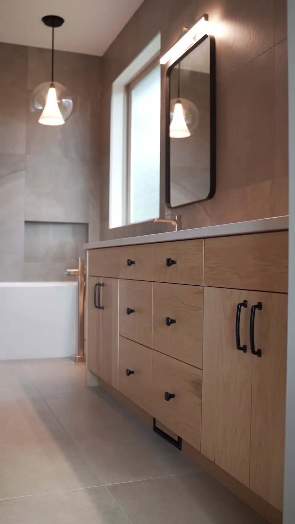 Bathroom renovations Kelowna — modern double vanity remodel Kelowna bathroom renovation with modern double vanity and elegant finishes